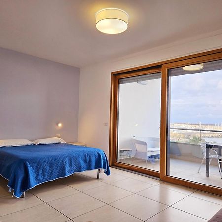 Dolphin'S Home Porto Torres Bagian luar foto