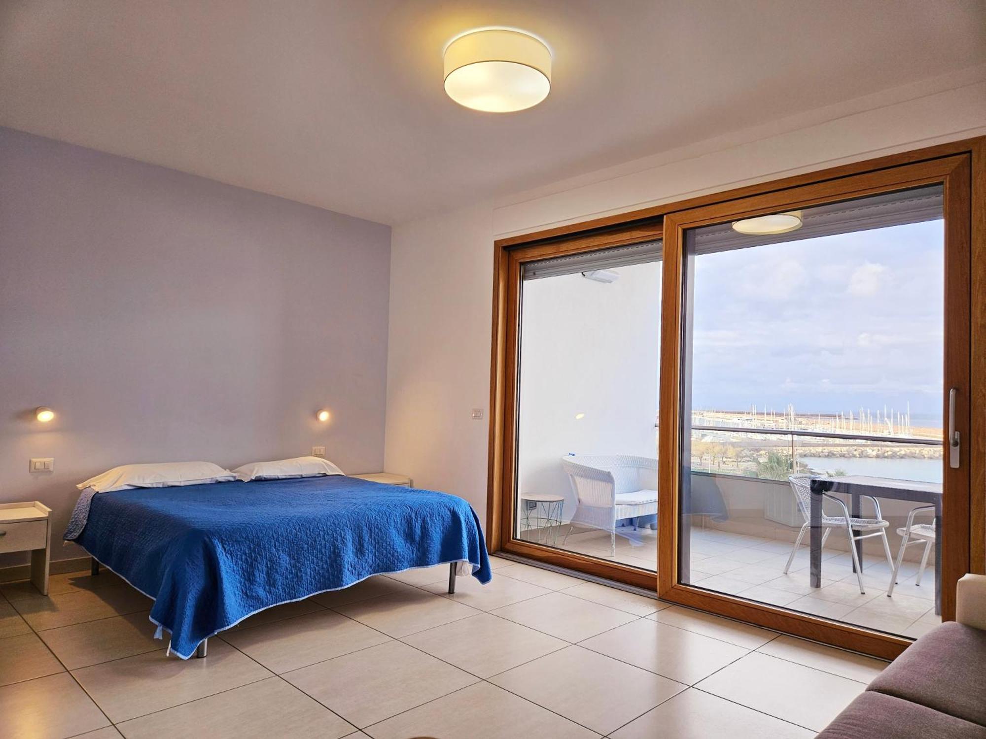 Dolphin'S Home Porto Torres Bagian luar foto